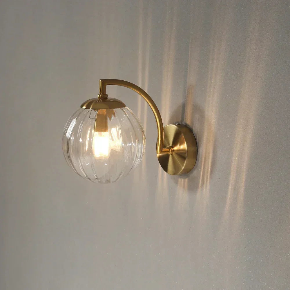 Modern LED wall sconce lamp, adding an elegant touch to bedroom ambiance.