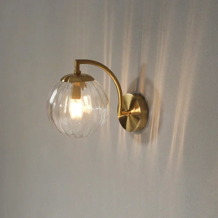 Modern LED wall sconce lamp, adding an elegant touch to bedroom ambiance.