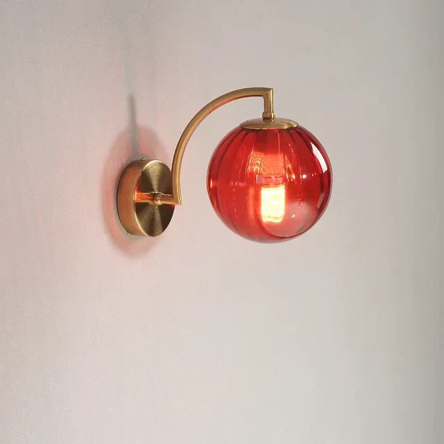 Modern glass LED wall sconce, an elegant addition to home decor.
