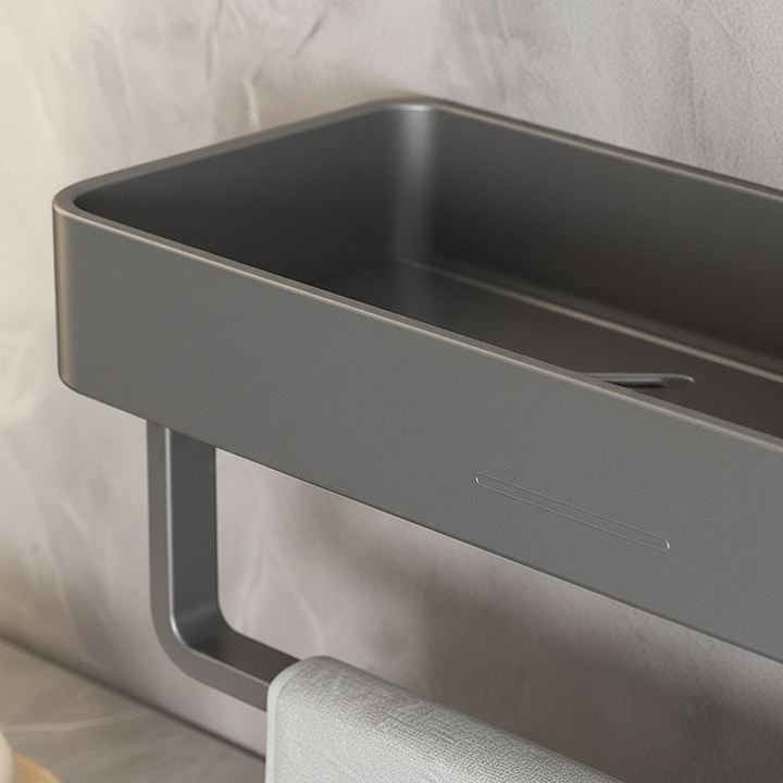 Close-up of a matte gray Organixy wall shelf, highlighting its smooth modern finish