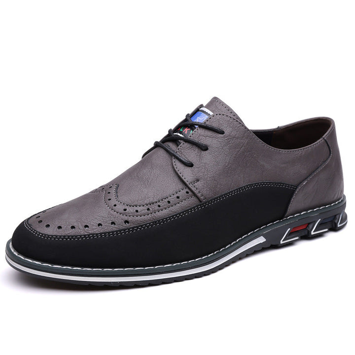 Close-up of men's hybrid dress shoes, highlighting brogue details and comfortable sole.