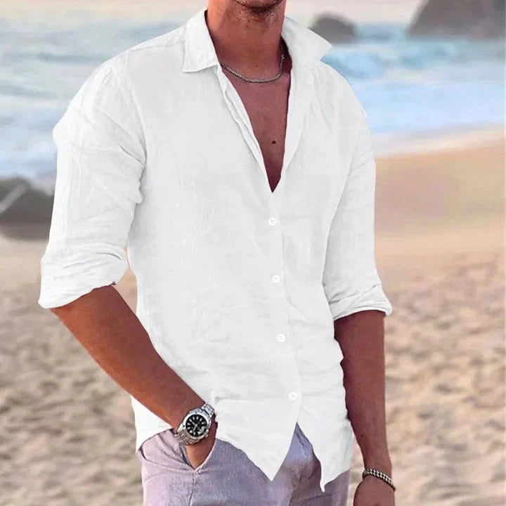 Modern men's lightweight white cotton long-sleeve shirt. Versatile for casual & formal, breathable spring/summer comfort.