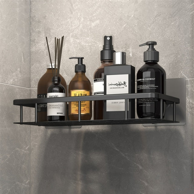 Elegant metal suction wall shelf for bathroom organization. A modern, no-drill storage solution.