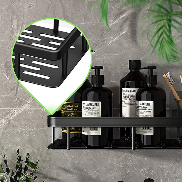 Sleek single-tier metal suction shower caddy. Minimalist no-drill design for bathroom essentials.
