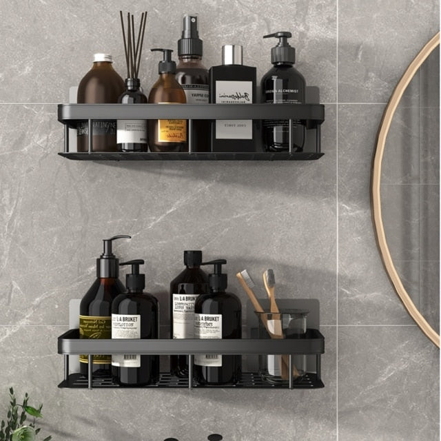 Efficient no-drill suction cup wall shelf. Modern metal design for bathroom storage solutions.