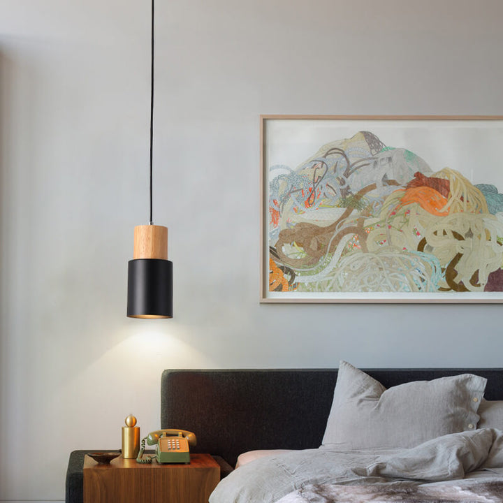 Group of modern LED cylinder pendant lamps, minimalist design for contemporary space.