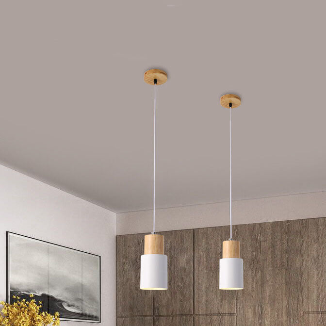 Minimalist LED cylinder pendant lamp, elegant modern lighting for living room.