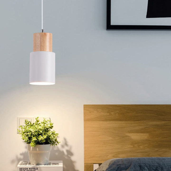 Set of two modern minimalist LED cylinder pendant lamps, perfect for kitchen or dining.