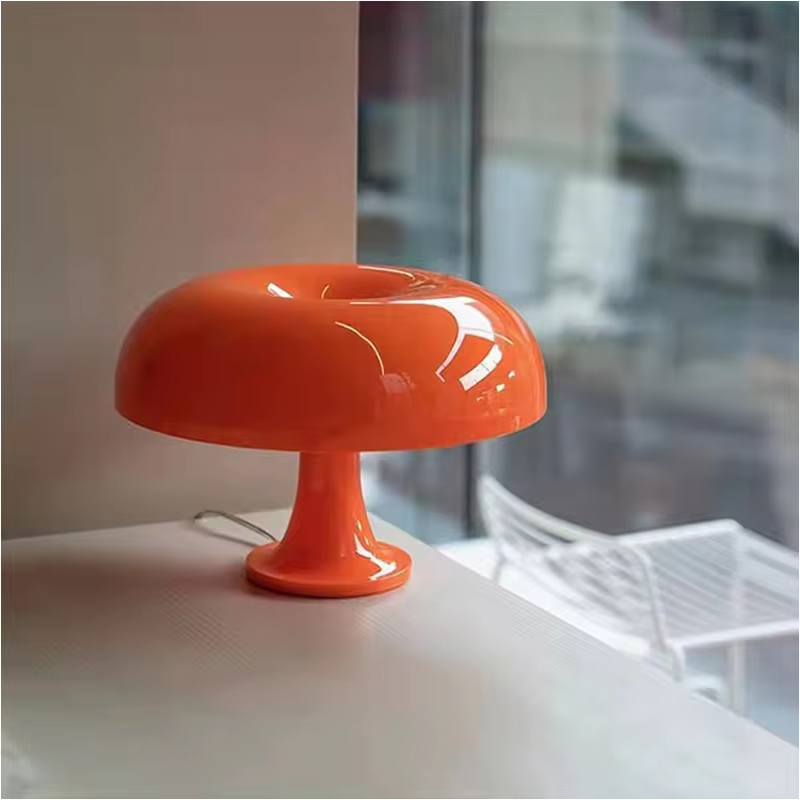 Modern minimalist LED toadstool table lamp, ideal for ambient lighting in bedrooms or living rooms.