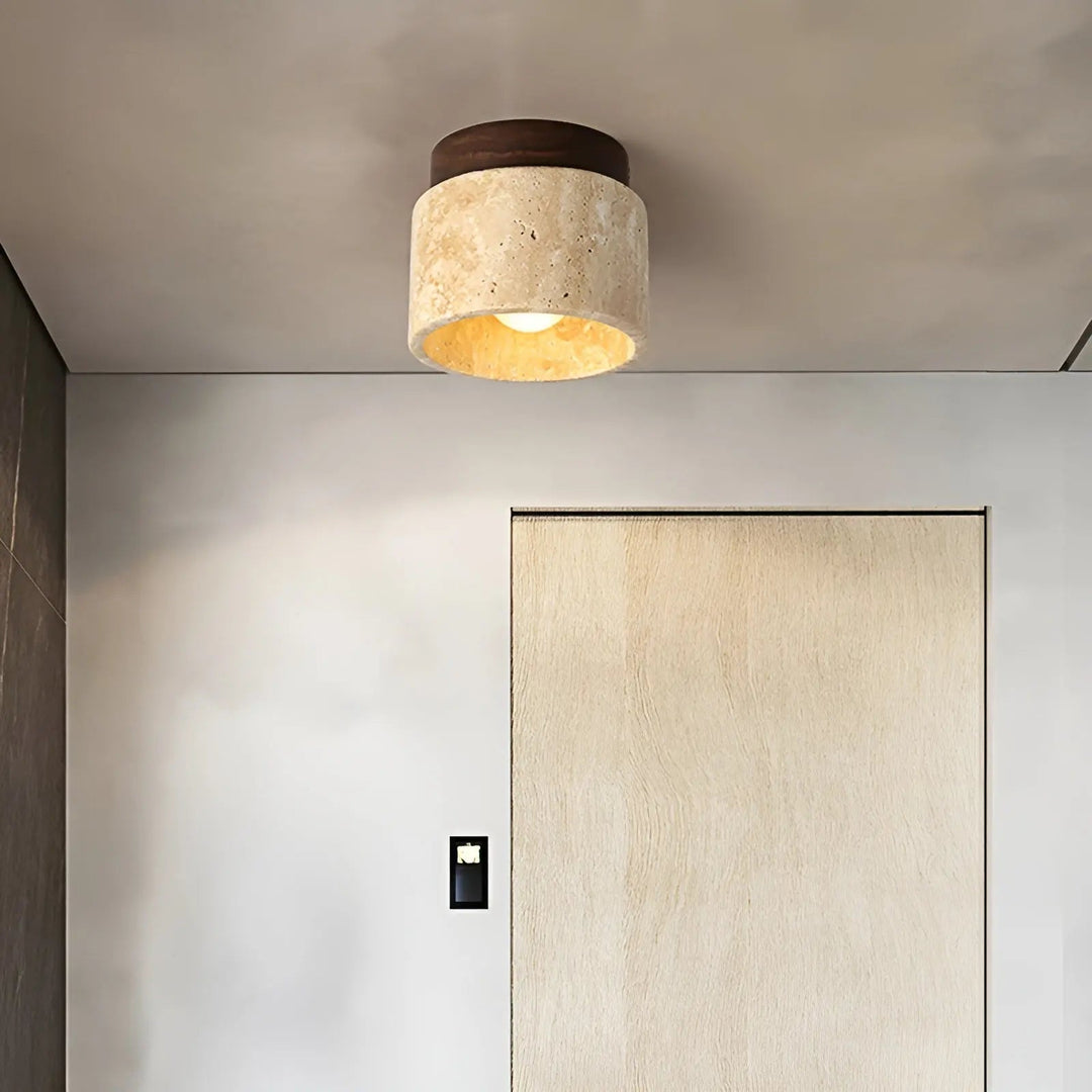 Modern minimalist travertine & wood ceiling lamp, perfect for serene living room ambiance.