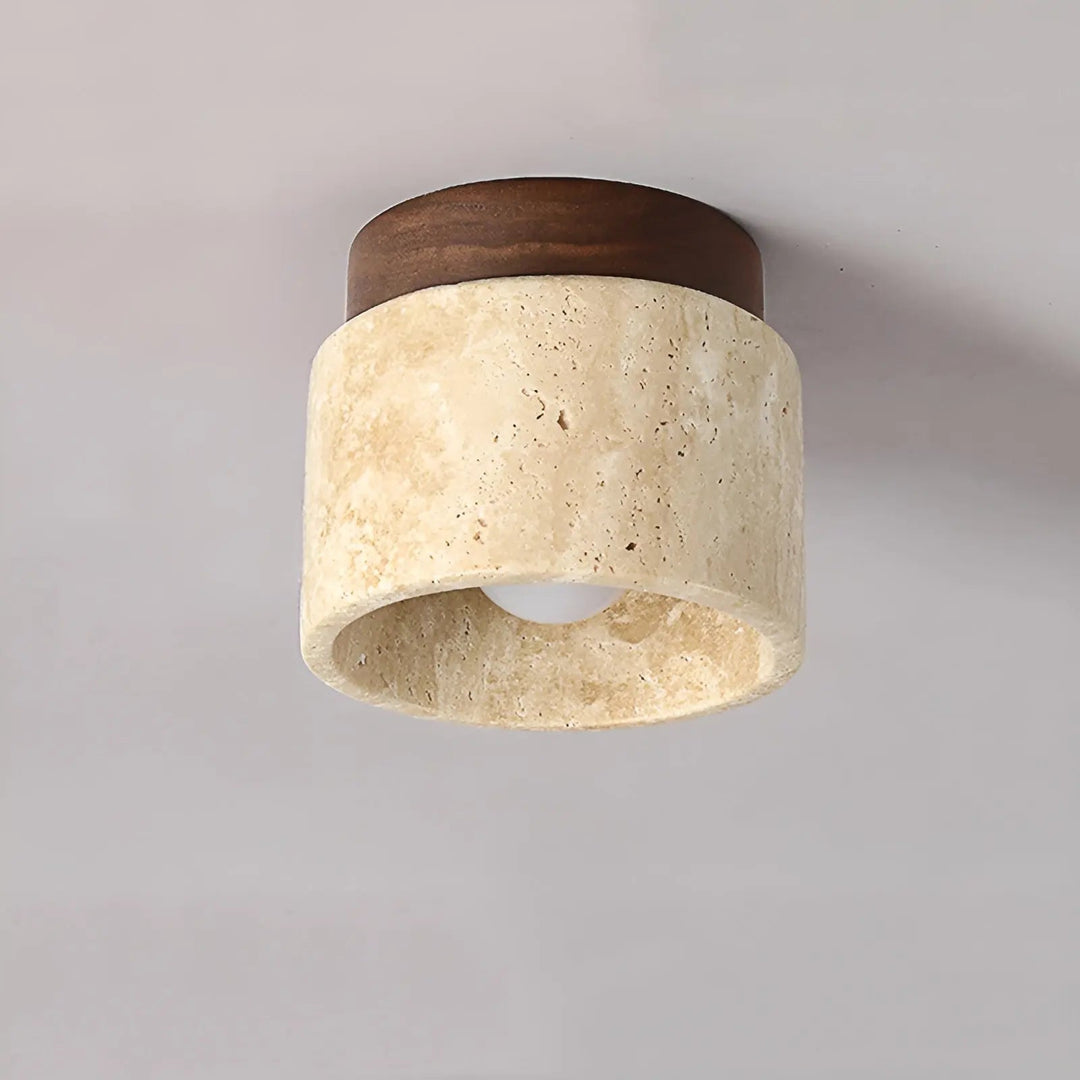 Wabi-sabi style ceiling lamp with natural travertine and wood, ideal for a peaceful bedroom.