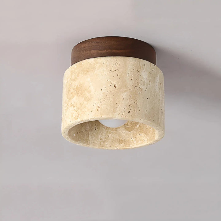 Wabi-sabi style ceiling lamp with natural travertine and wood, ideal for a peaceful bedroom.