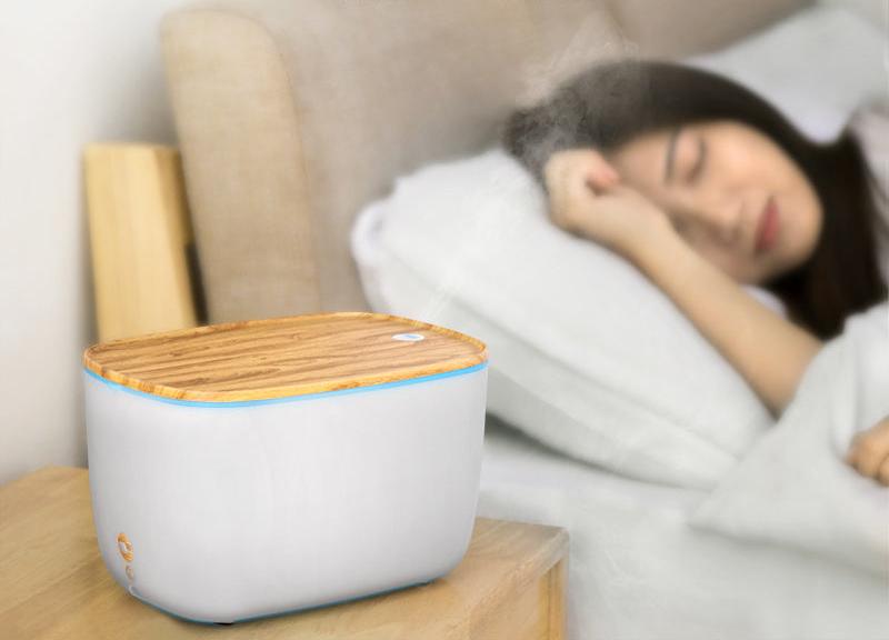 Modern MistFlow aroma diffuser & humidifier with essential oil diffusion & ambient LED mood light for home comfort.