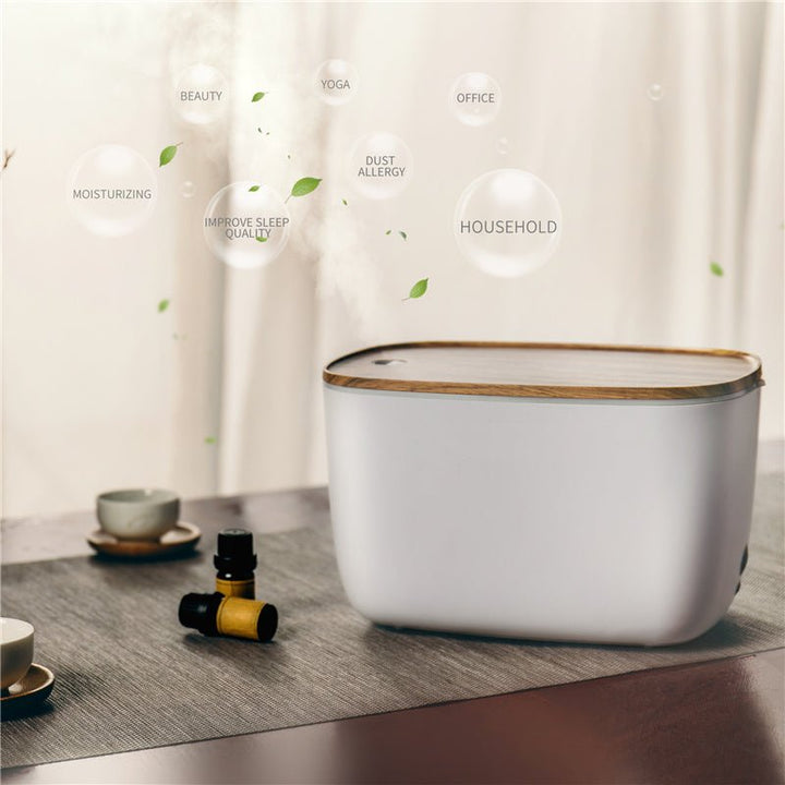 Sleek MistFlow aroma diffuser & humidifier with colorful LED mood light, perfect for home aromatherapy & air moistening.