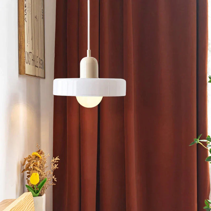 Stylish ceiling fixture, brass finish, adds a touch of luxury to decor.