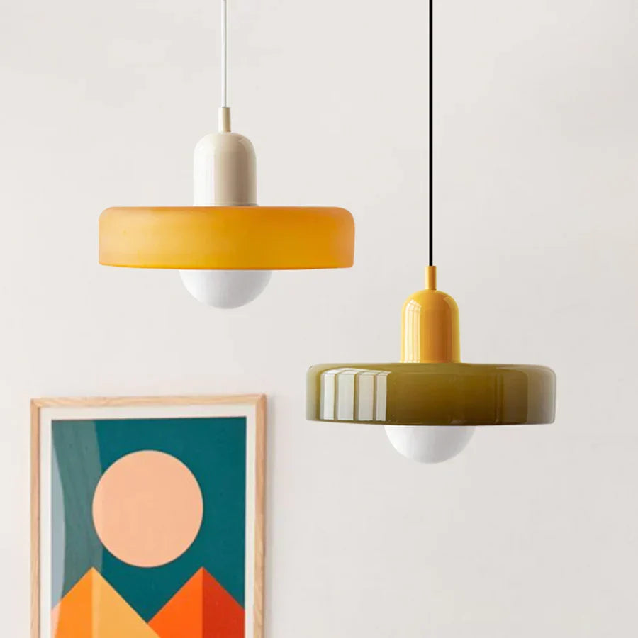 Sleek modern hanging lamp, black metal finish, enhances any home interior.
