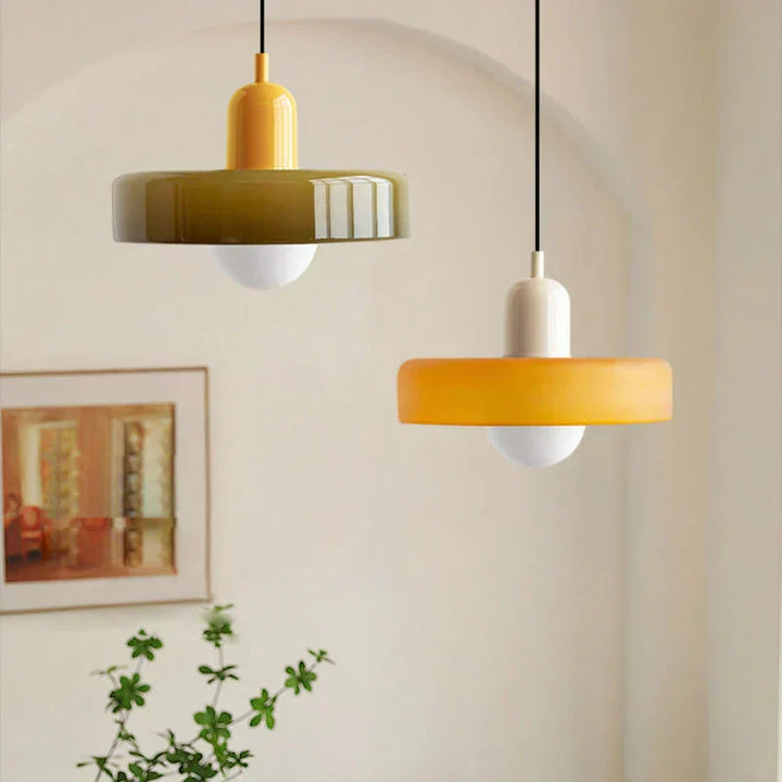 Adjustable hanging lamp, stylish glass design for modern interior aesthetics.