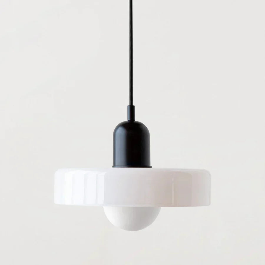 Stylish NordicLuxe pendant light with clear glass shade for entryway lighting.