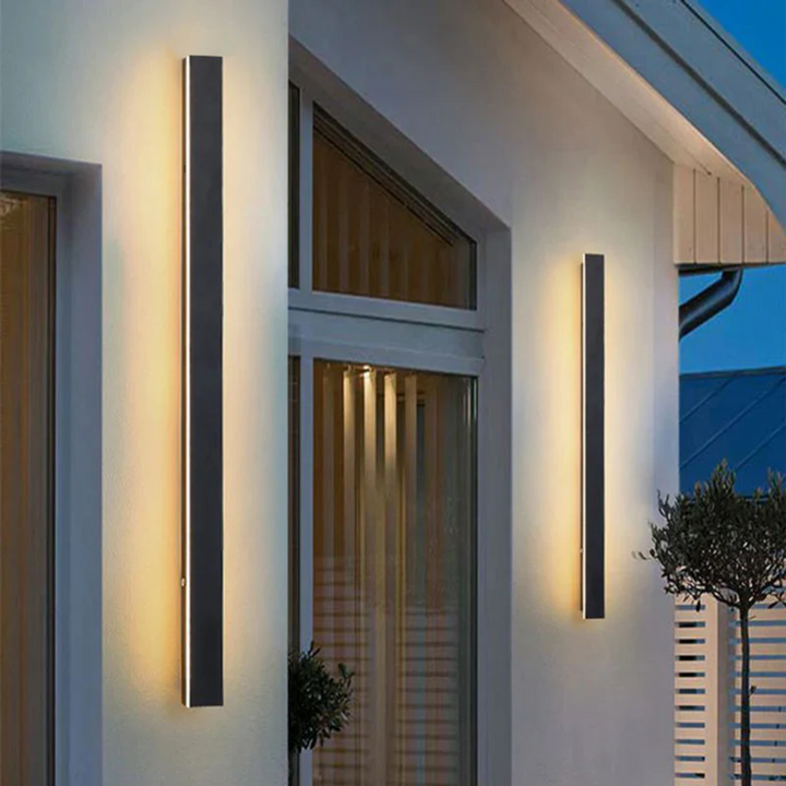 Minimalist modern LED wall lamp, sleek linear design for outdoor, patio, & entryway illumination.