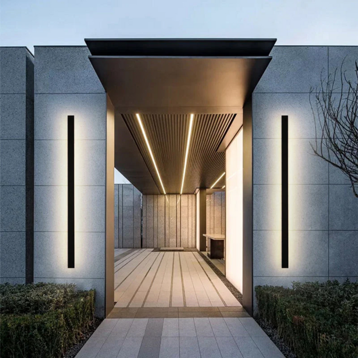 Smart motion sensor LED outdoor wall lamp, modern design for automated garden lighting.