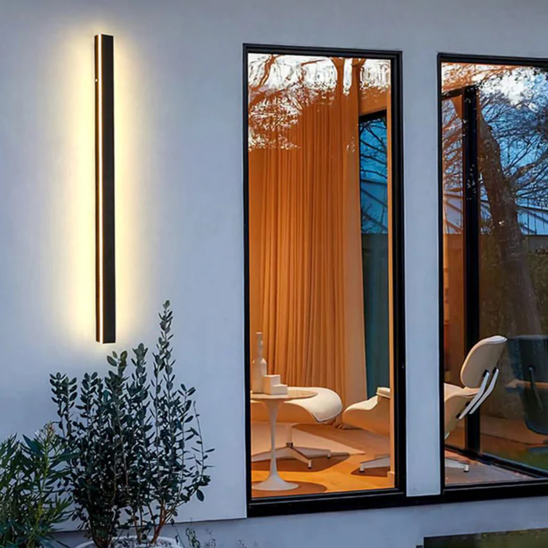 Architectural modern LED wall lamp. Linear waterproof design enhances home & garden aesthetics.
