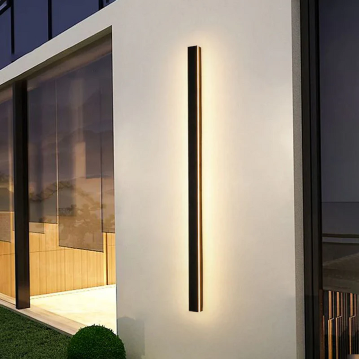 Dimmable LED outdoor wall light, modern linear design for patio, facade, and garden ambiance.