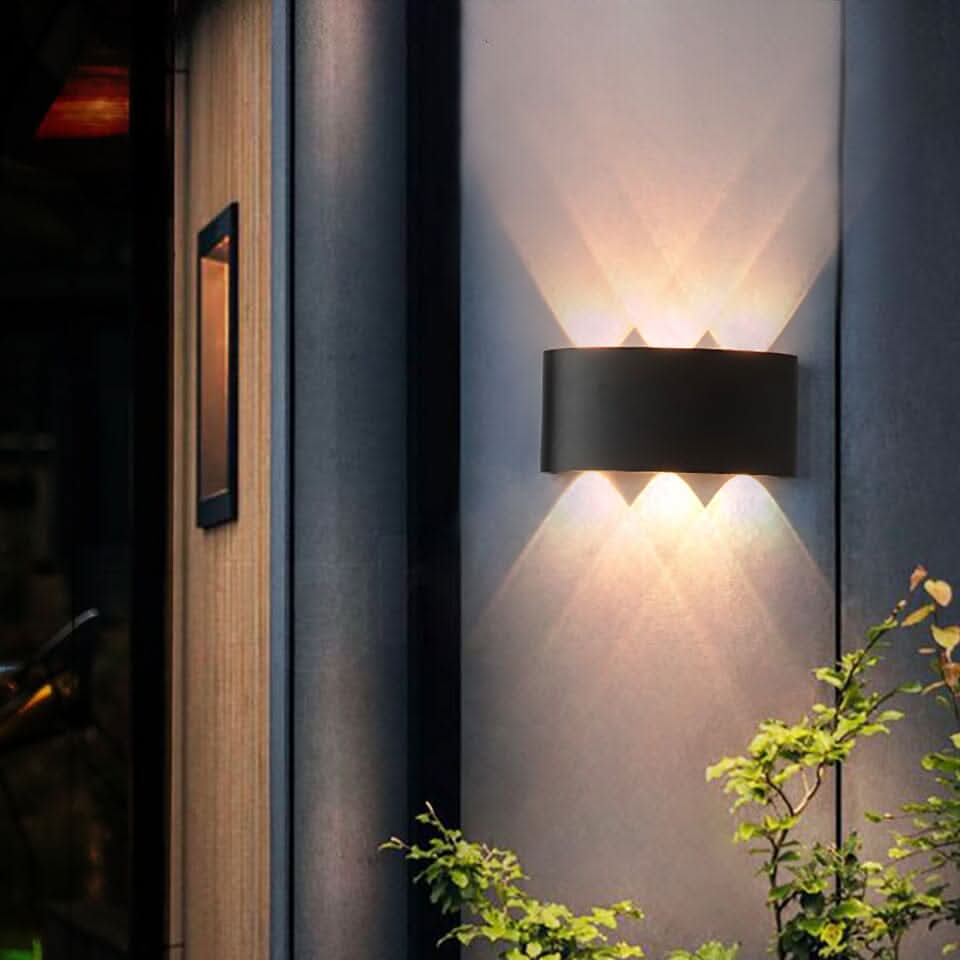Modern outdoor LED wall light, sleek weatherproof exterior fixture for patio & garden.