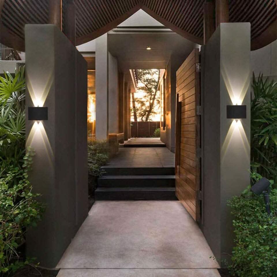 Weatherproof outdoor LED wall light with a durable modern design for exterior lighting.