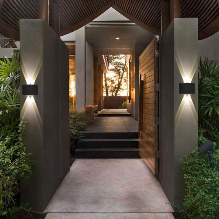 Weatherproof outdoor LED wall light with a durable modern design for exterior lighting.