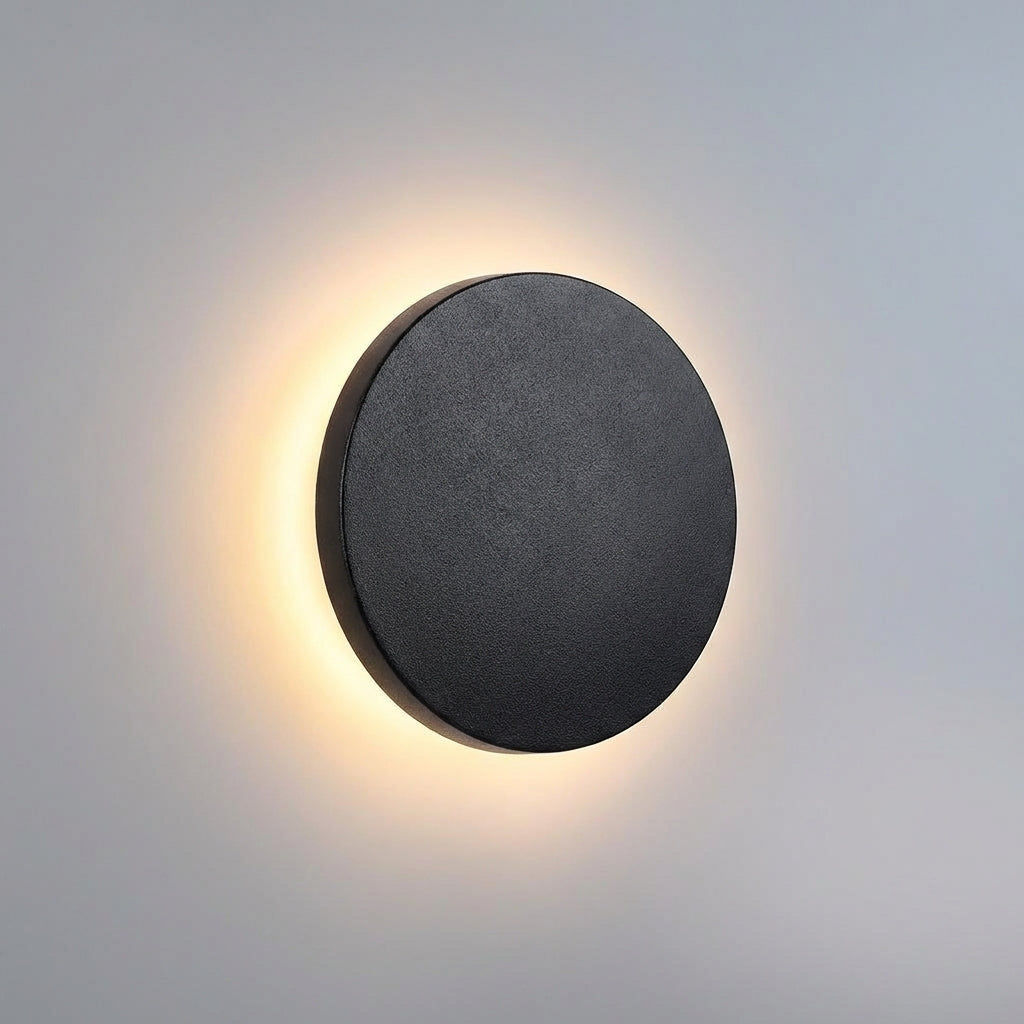 Sleek Solunex modern round outdoor wall light fixture, waterproof stainless steel for garden lighting.
