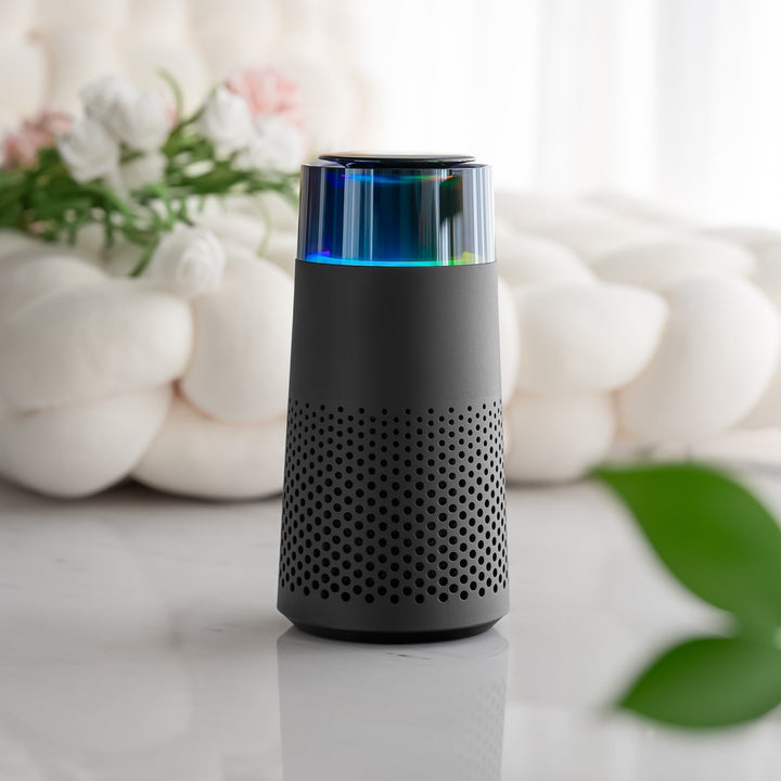 PetFresh device: sleek pet odor eliminator, humidifier, and air purifier for a clean home.