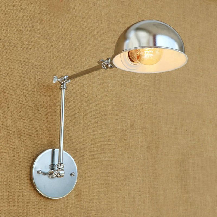 Versatile swing arm wall lamp, perfect task light for reading in a modern home