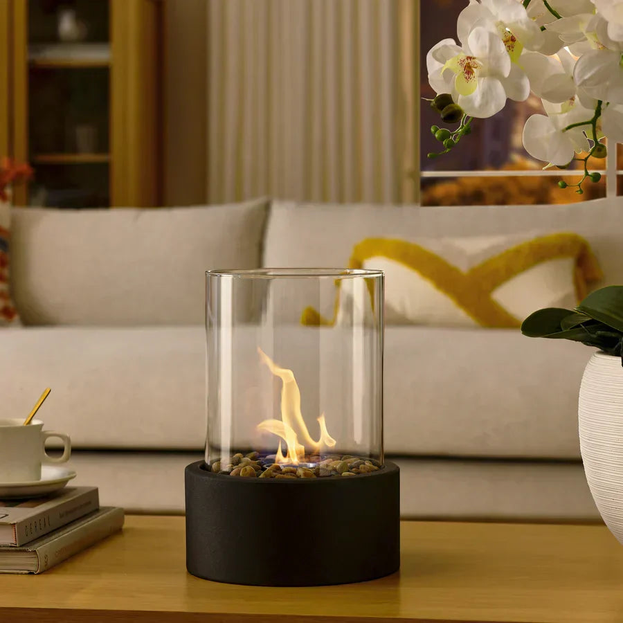 Portable tabletop fire pit creating a cozy indoor flame or an inviting outdoor atmosphere.