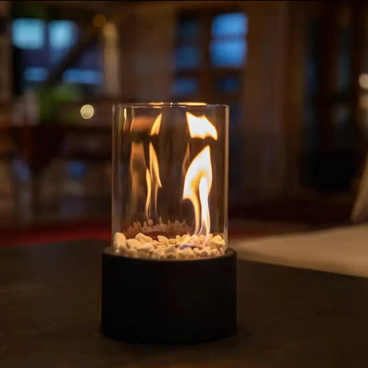 Stylish mini fire pit with a clean design, providing ambiance for any tabletop, indoors or out.