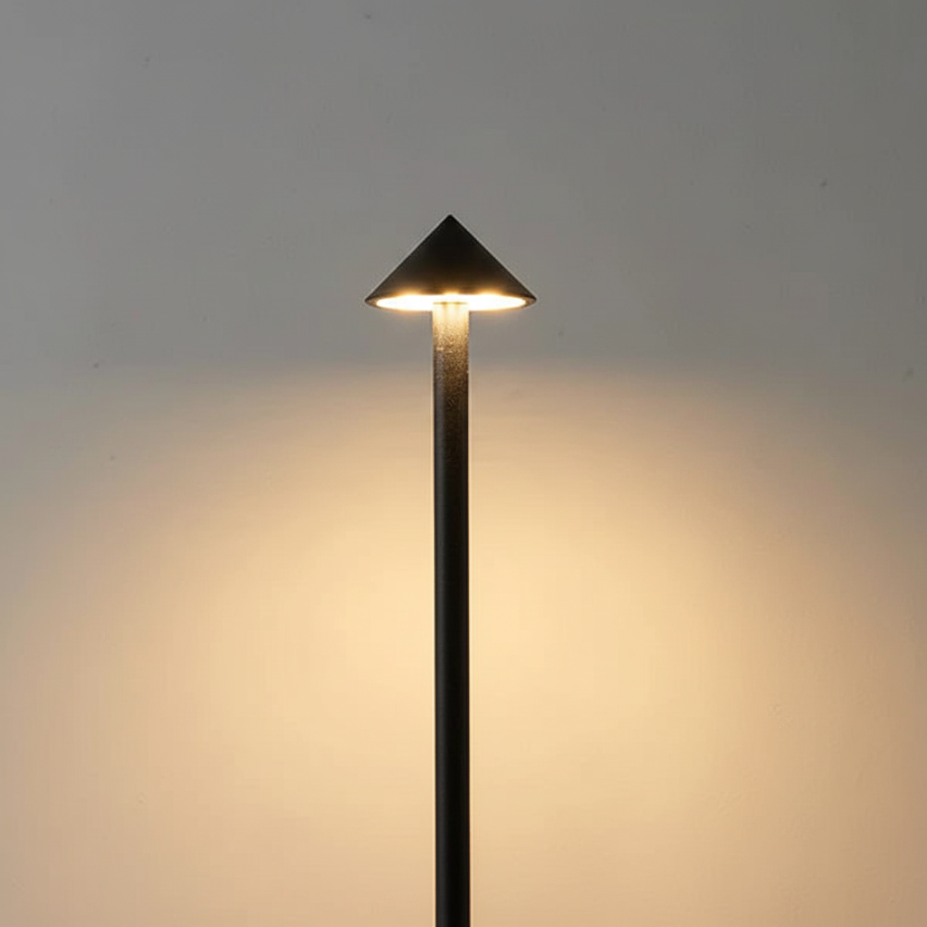 Sleek aluminum LED table lamp. Modern rechargeable design for portable ambient or desk lighting.
