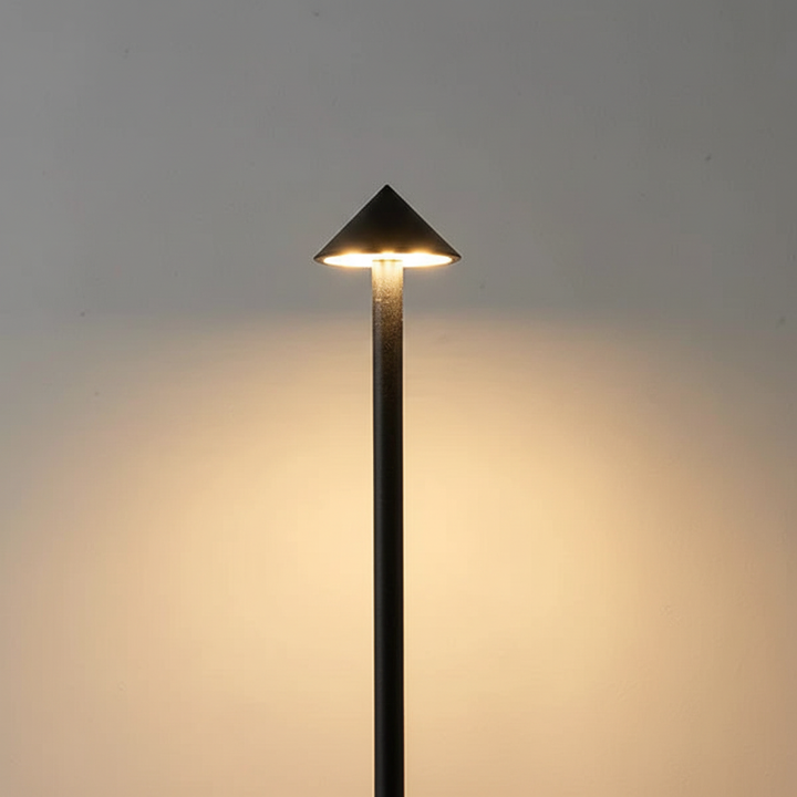 Sleek aluminum LED table lamp. Modern rechargeable design for portable ambient or desk lighting.