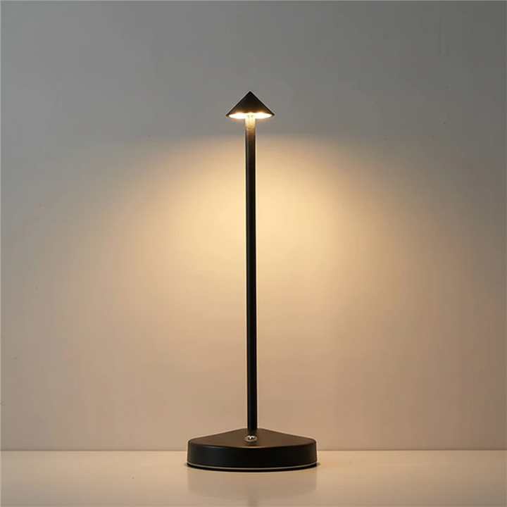 GlowArrow modern rechargeable LED table lamp. Portable cordless design for ambient or desk lighting.