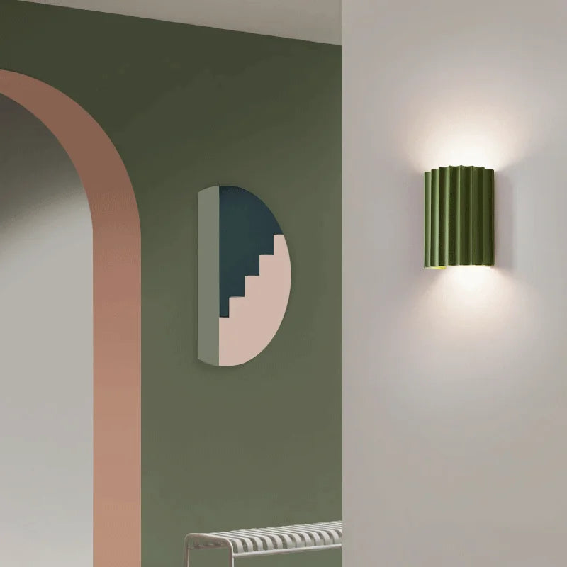 Contemporary resin wall lamp with unique texture, ideal for modern indoor lighting & sophisticated home decor.