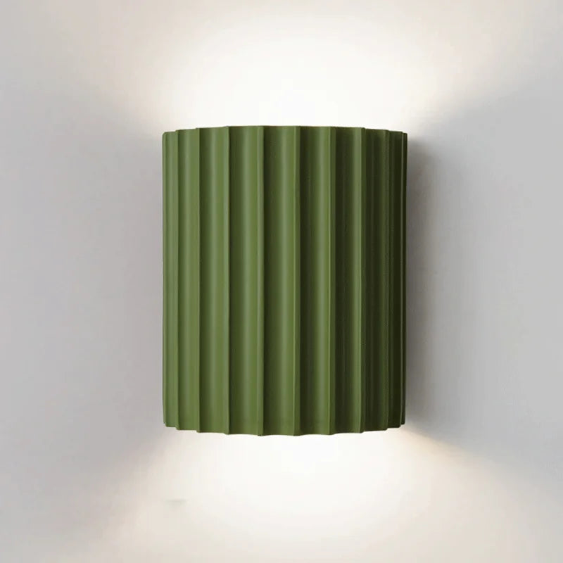 LED wall lamp for bedroom, corridor, or living room. Modern resin design provides stylish accent lighting.