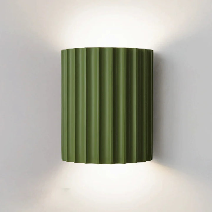 LED wall lamp for bedroom, corridor, or living room. Modern resin design provides stylish accent lighting.