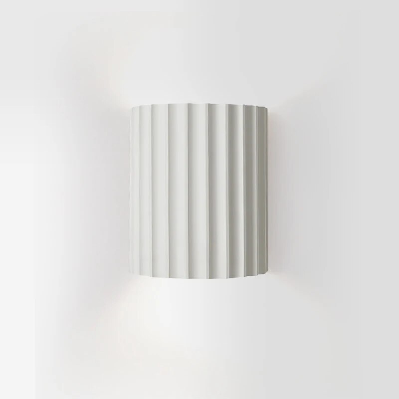 Abstract resin wall lamp, a chic modern lighting fixture for indoor corridors or sophisticated living areas.