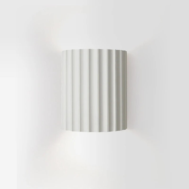 Abstract resin wall lamp, a chic modern lighting fixture for indoor corridors or sophisticated living areas.