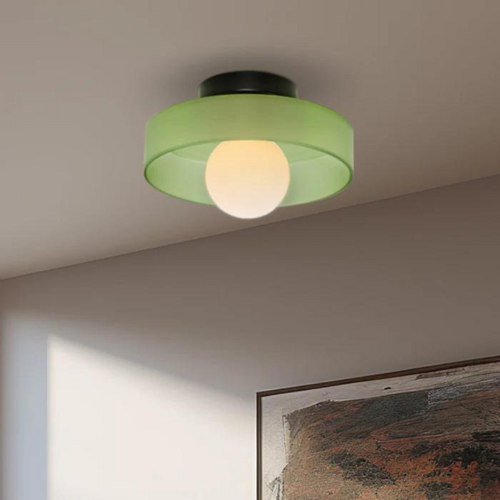 Round ceiling lamp, sleek design & versatile lighting for kitchen & living room.