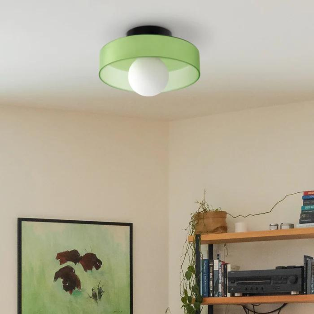 Elegant round ceiling lamp, modern flush mount design enhances interior decor.