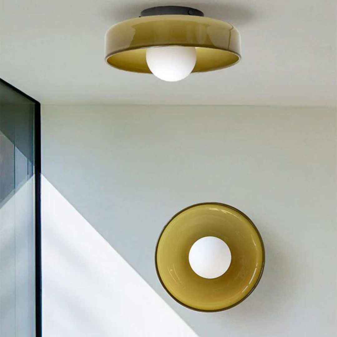 Stylish flush mount round ceiling lamp, adds elegance to modern interior design.