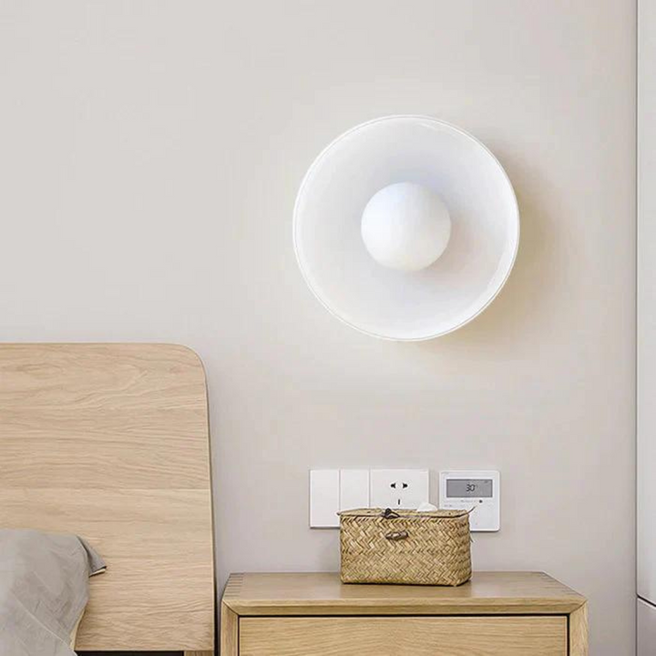 Stylish round ceiling lamp, sleek flush mount brightens any modern room.