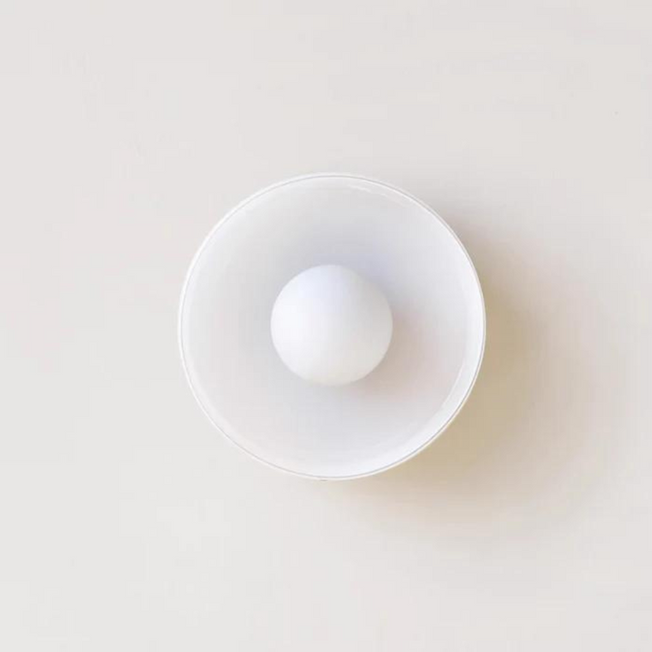 Round ceiling lamp with modern elegance, ideal for versatile home illumination.
