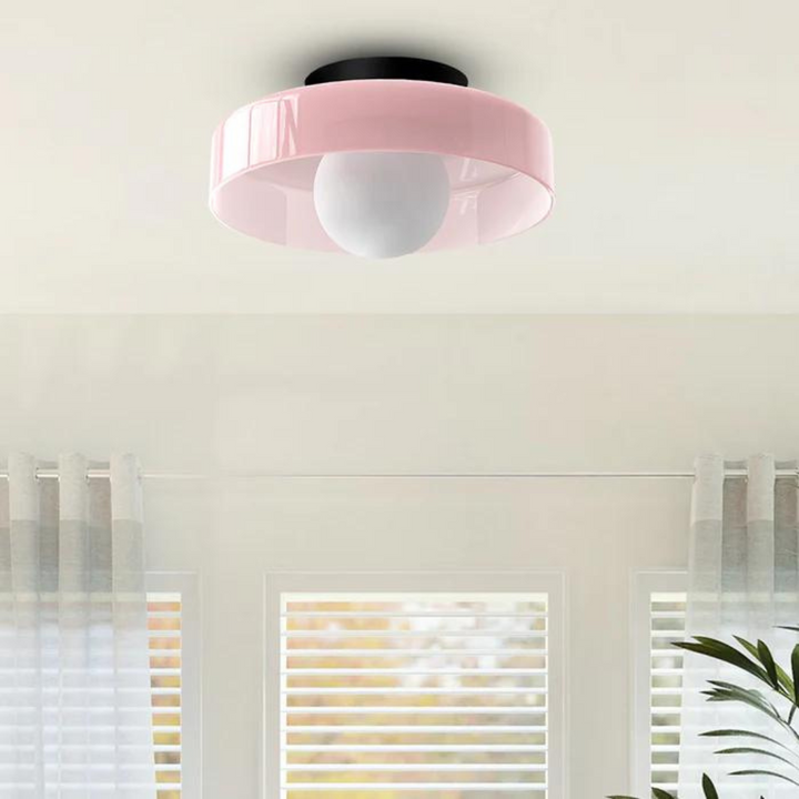 Modern round ceiling light, decorative flush mount for enhancing home ambiance.