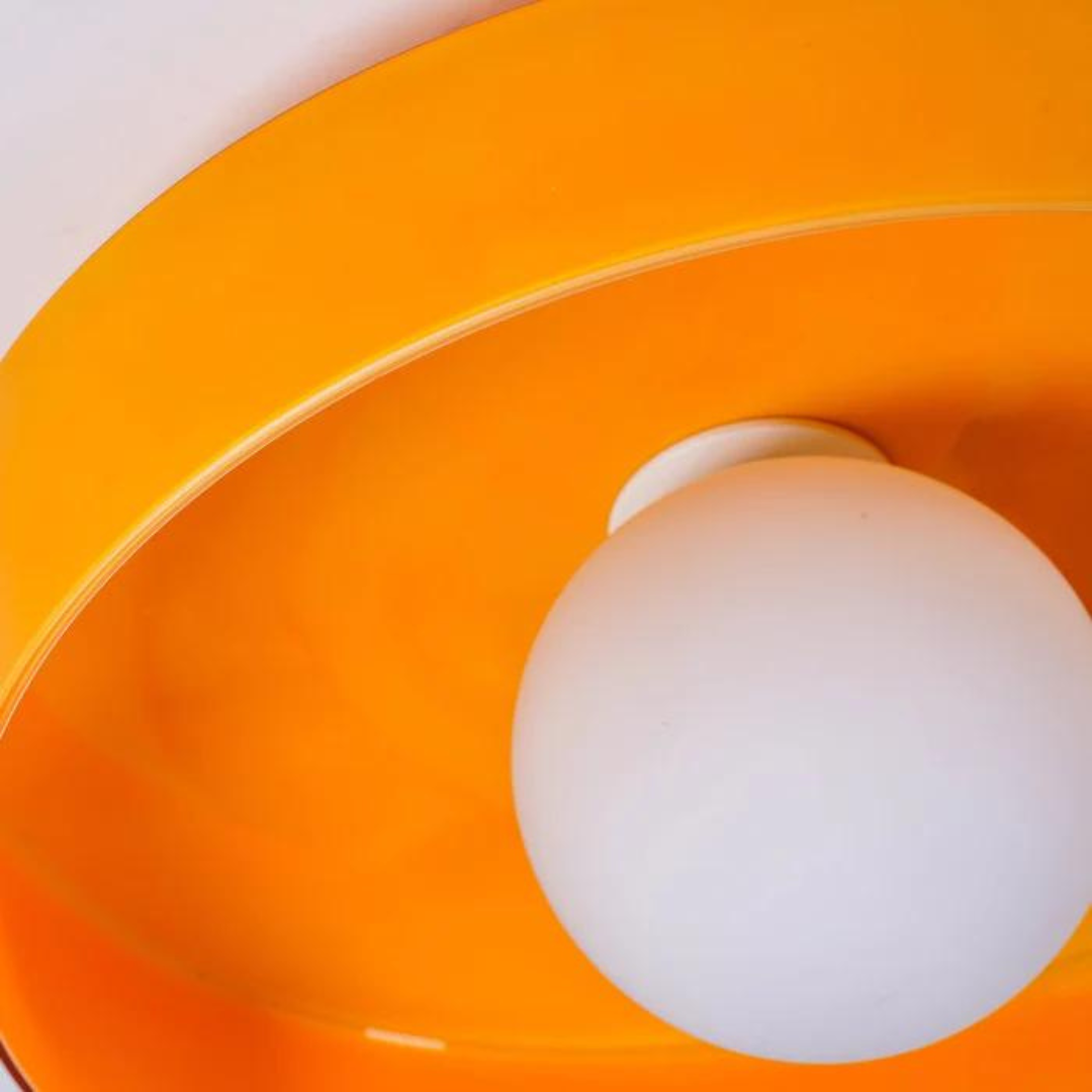 Sleek round ceiling lamp, modern flush mount for bright & elegant home lighting.