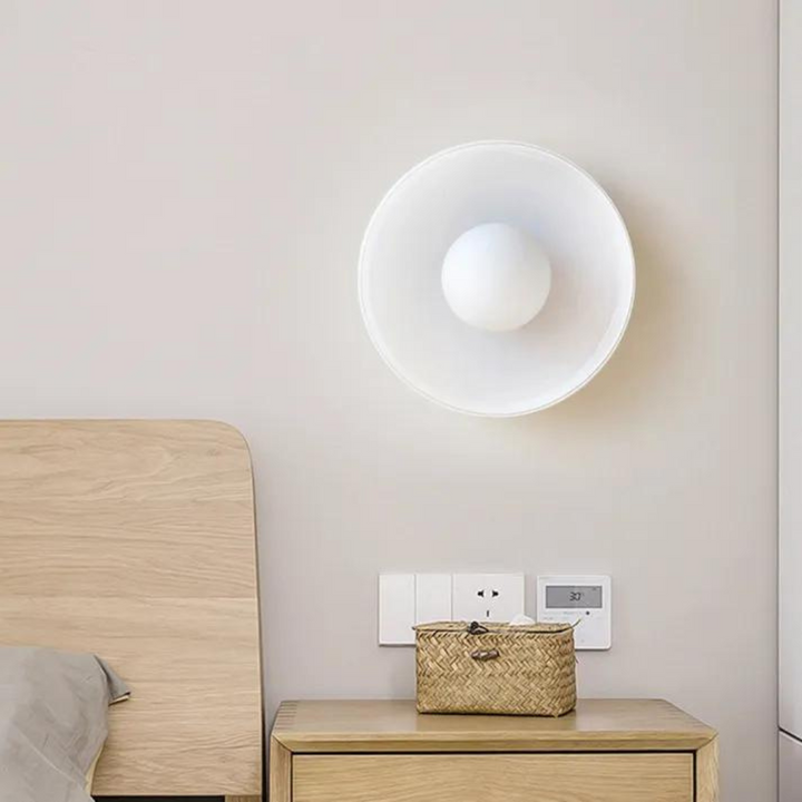 Stylish round ceiling lamp, flush mount for a modern, clutter-free look.